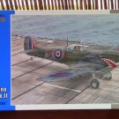 Special Hobby:n Supermarine Seafire Mk.II "Torch & Avalanche" rakennussarja No. SH 48102:n laatikon kansikuva; Mr. Hajekin maalaus majuri Al Wright:n "hainhampaisesta" Seafire LF.Mk.IIc koneesta. Special Hobby:n Supermarine Seafire Mk.II "Torch & Avalanche" rakennussarja No. SH 48102:n laatikon kansikuva; Mr. Hajekin maalaus majuri Al Wright:n "hainhampaisesta" Seafire LF.Mk.IIc koneesta.